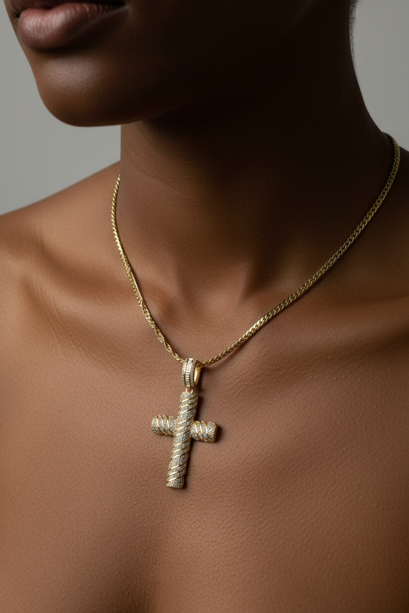Gold cross pendant on a chain