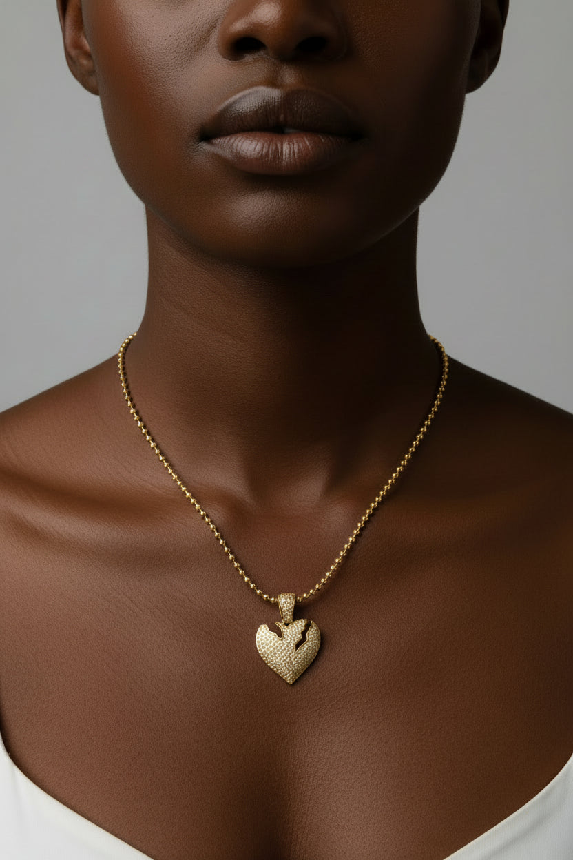 Gold heart-shaped pendant necklace
