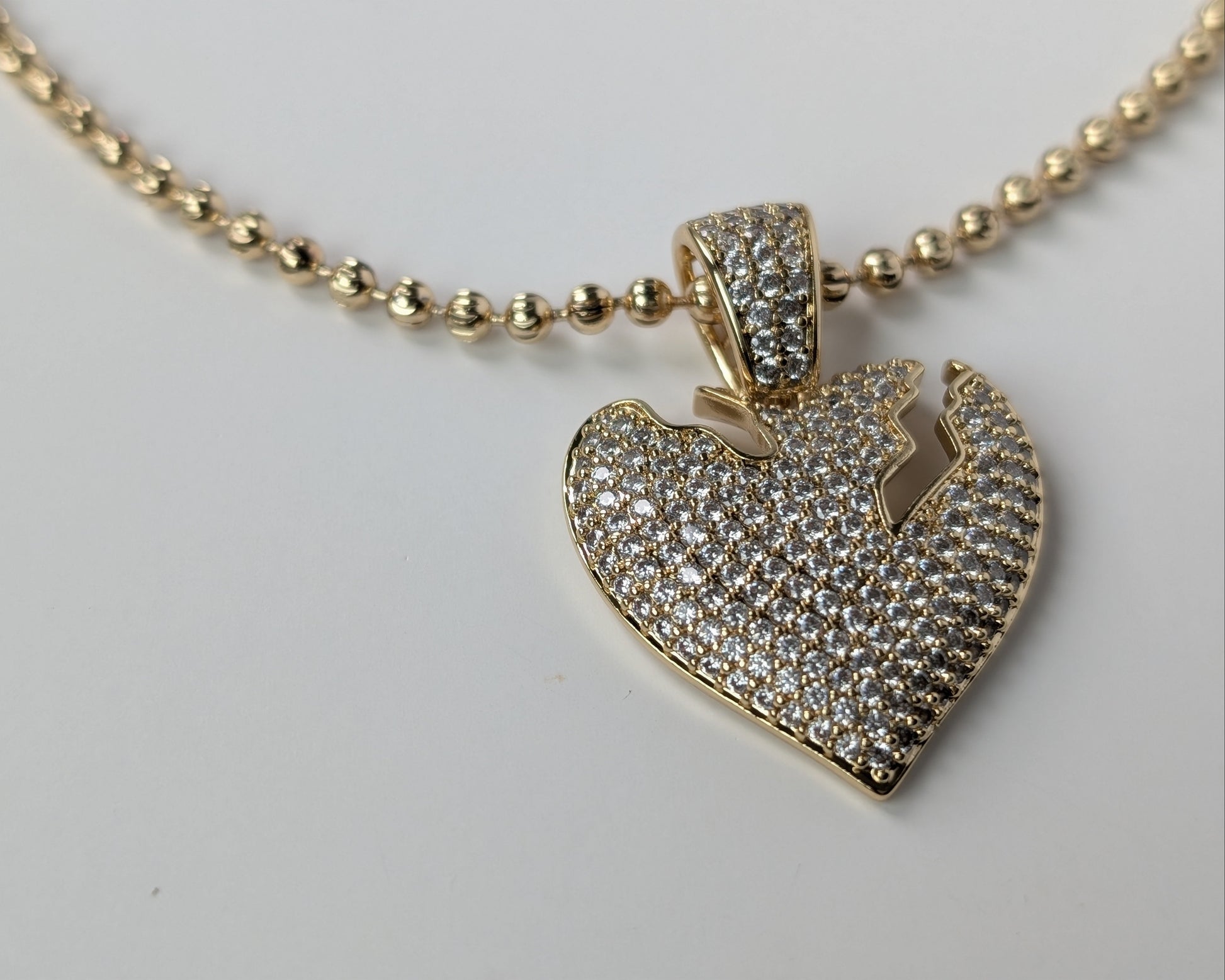 Gold heart-shaped pendant